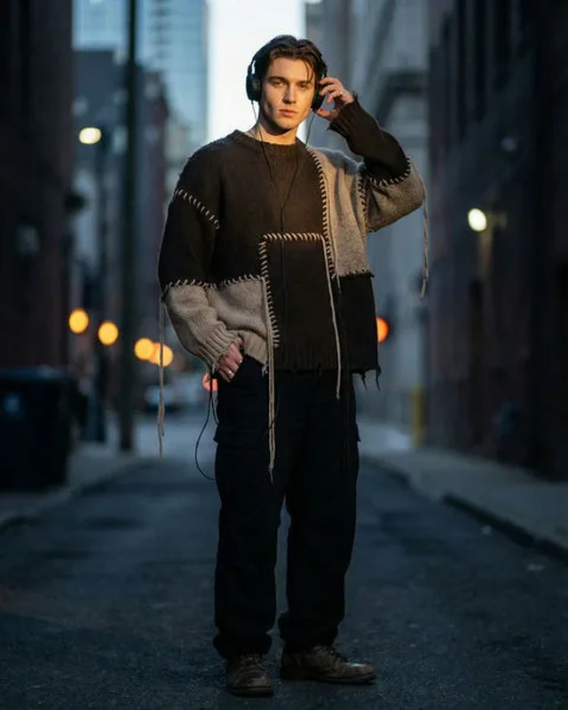 Loyal Ethan, a cash pig profile photographed on a city street at night